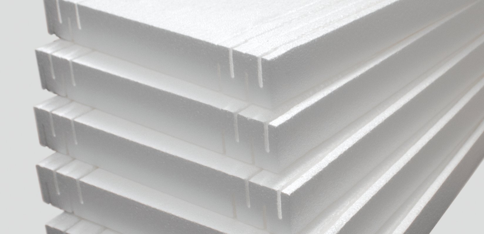 Subfloor cavity of an Auckland home with rigid polystyrene insulation fitted between timber floor joists